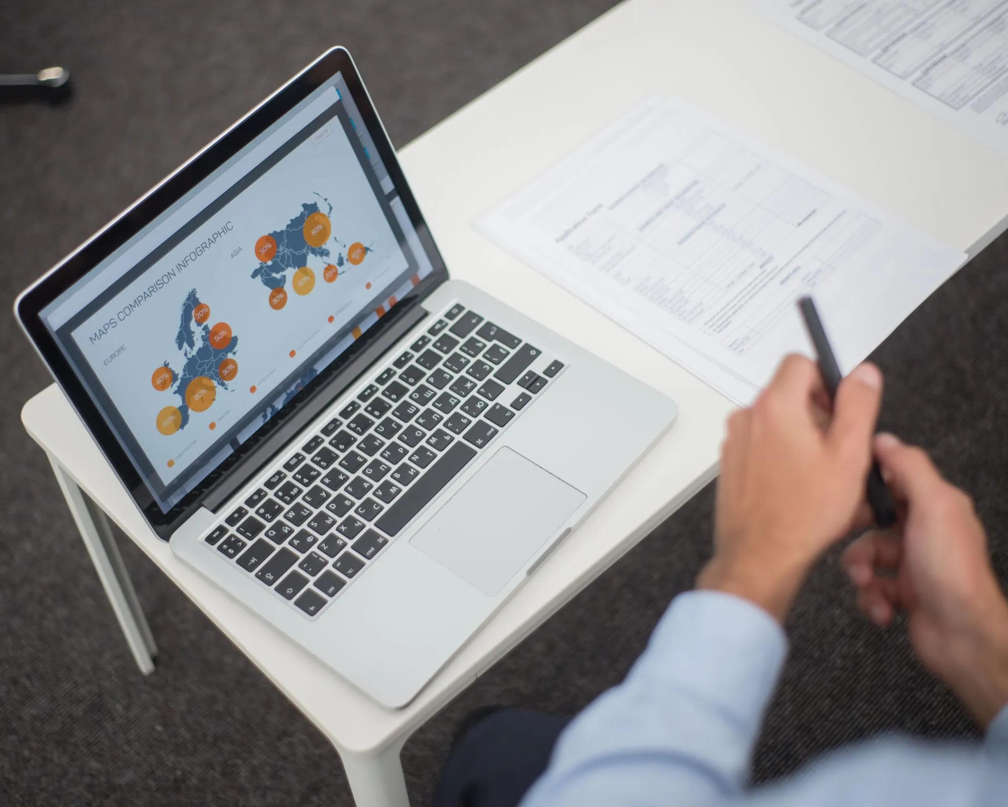Practice manager reviewing marketing performance analytics on a laptop