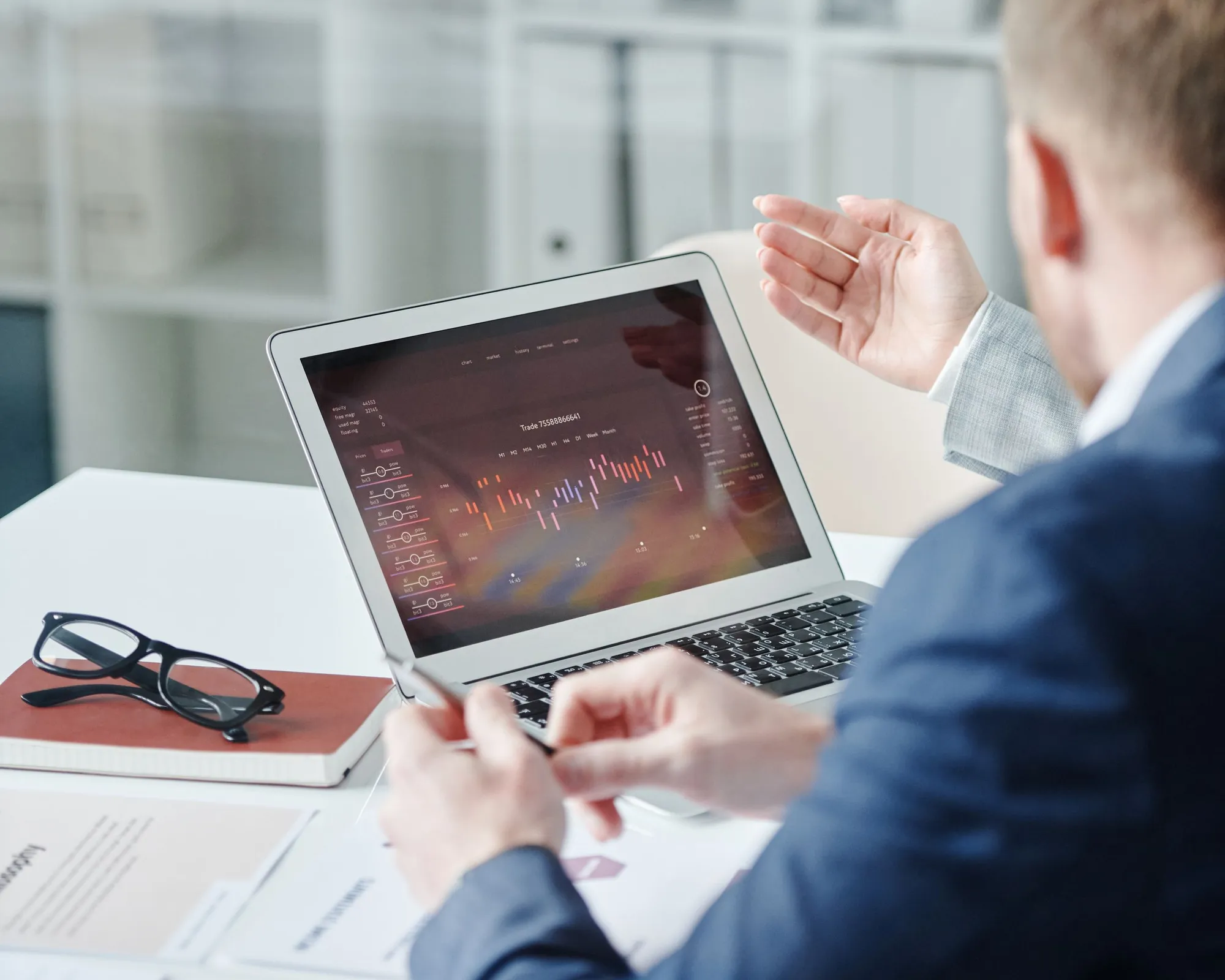 Healthcare administrators reviewing revenue cycle management reports and analytics